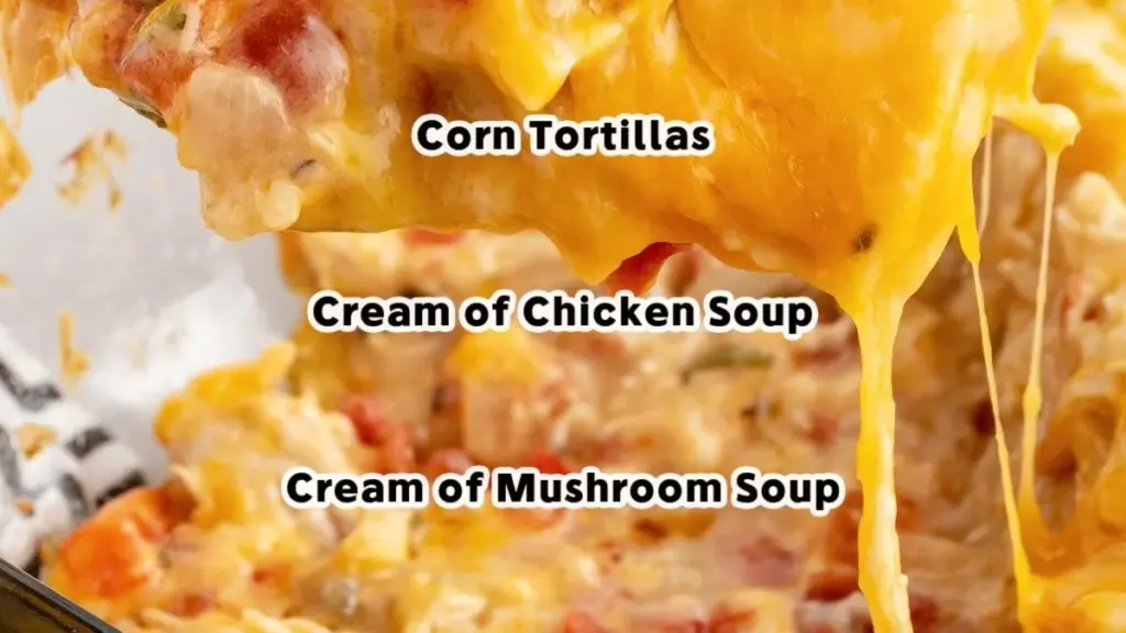 Scoop of King Ranch Chicken Casserole showing layers of chicken, cheese, Rotel, onion, and corn tortillas