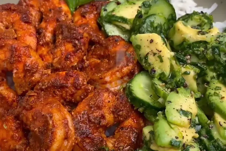 Chili Lime Shrimp Bowls with avocado cucumber salad, freshly made and ready to serve